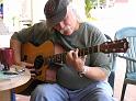 David Crosby checking  Rolo's guitar